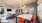 a clubhouse room with a large table and chairs
