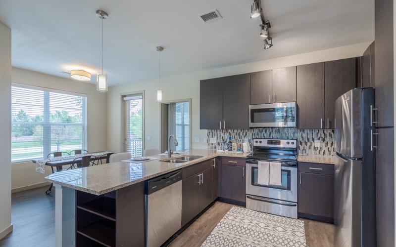 a kitchen with stainless steel appliances