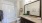 a bathroom with a marble countertop