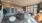 a clubhouse room with a couch and chairs